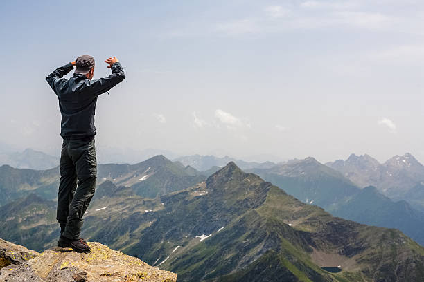 istock Walker Hiker Men on top of the Mountain 171297507