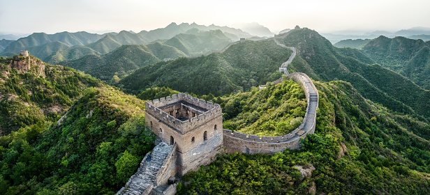 High resolution panoramic Aerial view of the Great Wall of China in the morning at Jinshanling section, Luanping county, Chengde, Hebei Province. 125 km (78 miles) northeast of Beijing. This section of the wall is connected with the Simatai section to the east