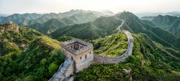 Panorama of Great Wall of China High resolution panoramic Aerial view of the Great Wall of China in the morning at Jinshanling section, Luanping county, Chengde, Hebei Province. 125 km (78 miles) northeast of Beijing. This section of the wall is connected with the Simatai section to the east badaling great wall stock pictures, royalty-free photos & images