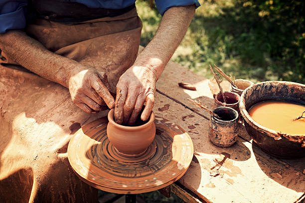 istock Old man and traditional pottery 171298129