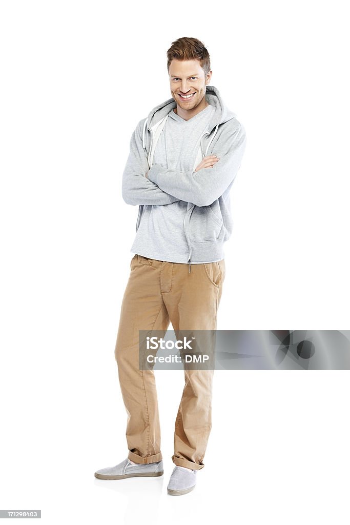 Retrato de joven casual guy standing sobre blanco - Foto de stock de Brazos cruzados libre de derechos