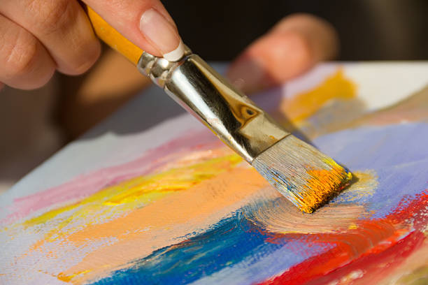 istock mixing oil paints with a brush 171298774