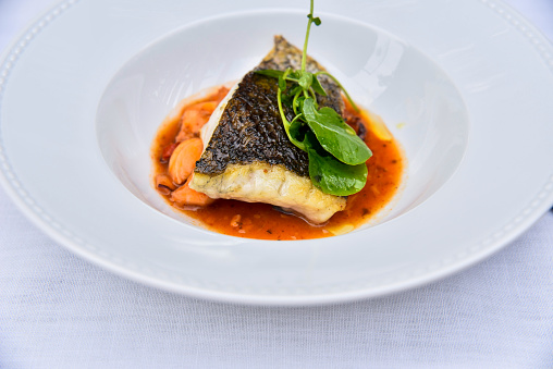 A healthy diet includes fish dishes as a source of protein and omega 3 fats.