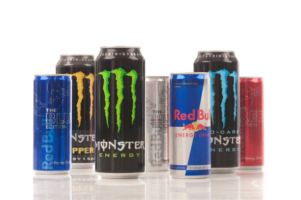 Red Bull and Monster energy drinks "Belgrade, Serbia - July 1st, 2012:Red Bull and Monster energy drinks with various tastes" energy drink stock pictures, royalty-free photos & images