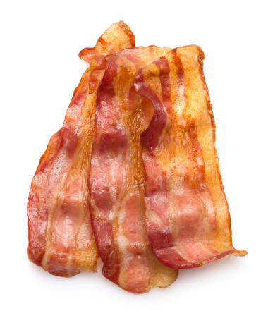 Three stripes of hot crispy bacon on white background