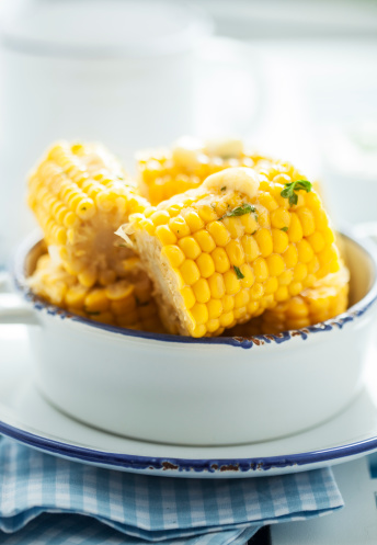 Steamed sweetcorn on the cob with butter