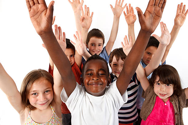 istock Group of multi-ethnic children cheer with hands raised 171301580