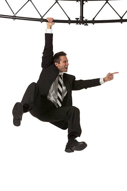 istock Businessman hanging from a metal structure 171302441