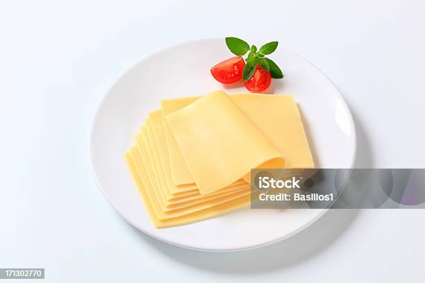 Sliced Cheese Stock Photo - Download Image Now - Basil, Cheese, Close-up