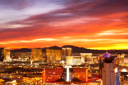 Beautiful orange, red and yellow tones reflect on the Las Vegas Strip.