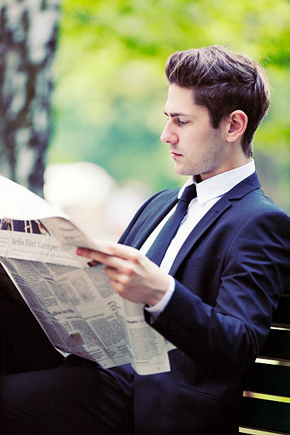 istock Businessman Reading Morning News 171303058