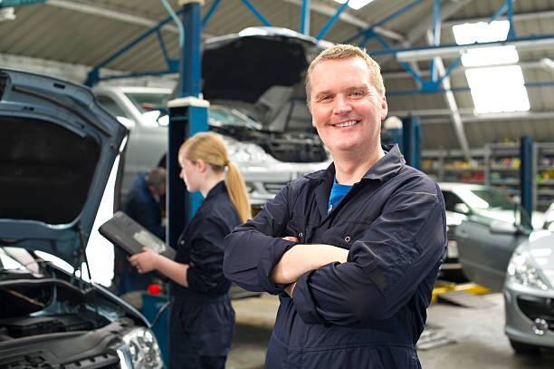 istock Male Mechanic With Trainee 171303307