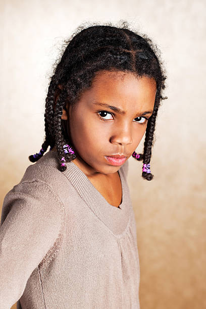 怒っている女性。 - anger child braids braided ストックフォトと画像