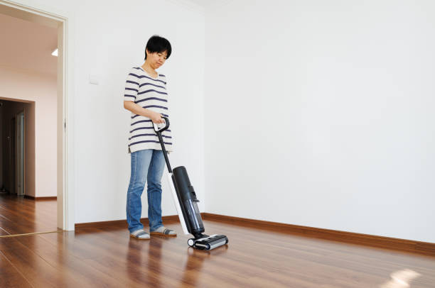 Retro vacuum cleaner isolated on the white background