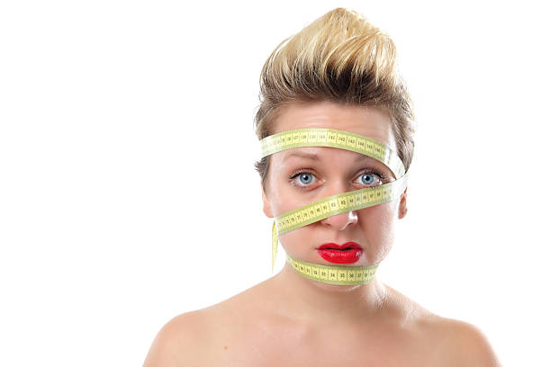 istock Woman with Tape Measure - Diet Trap 171303803