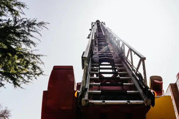 High deployed ladder of a fire truck.