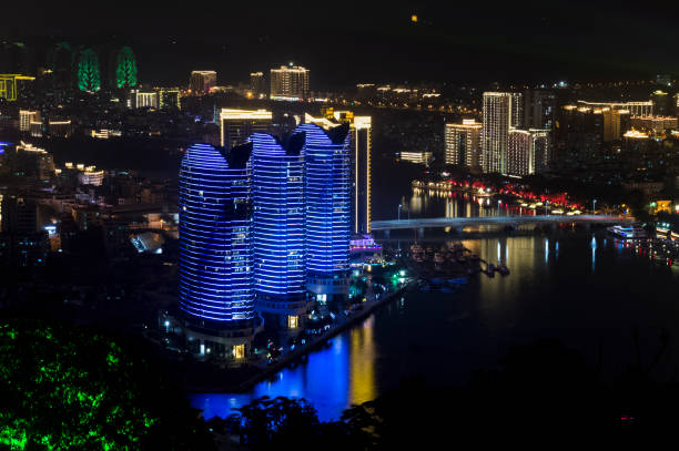 Sanya, China Jan 22, 2019. night view of the city of Sanya from the observation deck. Sanya, China Jan 22, 2019. night view of the city of Sanya from the observation deck. phenix stock pictures, royalty-free photos & images