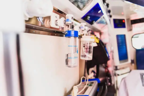 Detail of the interior of an ambulance, equipped with oxygen breathing system and other medical materials.