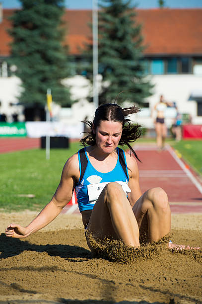 istock Young woman at long jump 171304230