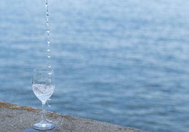 pour water into a glass