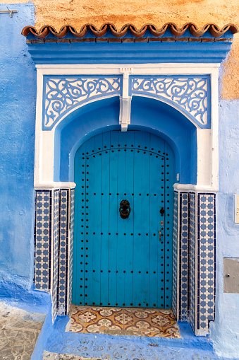 Colorful door. Chefchaouen, or Chaouen, is a city in the Rif Mountains of northwest Morocco.  It’s known for the striking, blue-washed buildings of its old town.