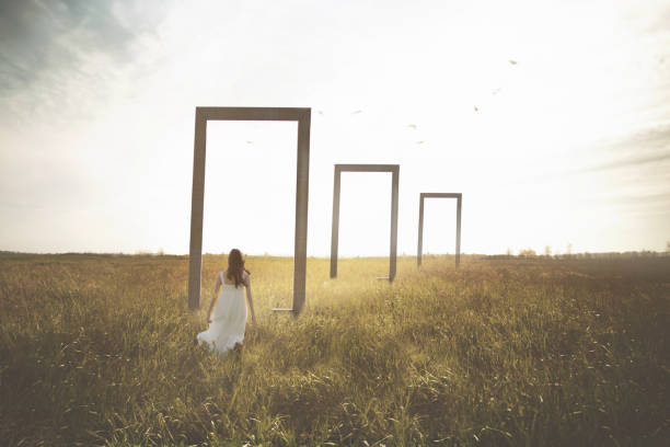 istock woman running towards surreal doors, abstract concept 1713048542