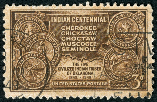Cancelled Stamp From The United States Featuring Five Native American Tribes That Were Forced To Resettle In The State Of Oklahoma.
