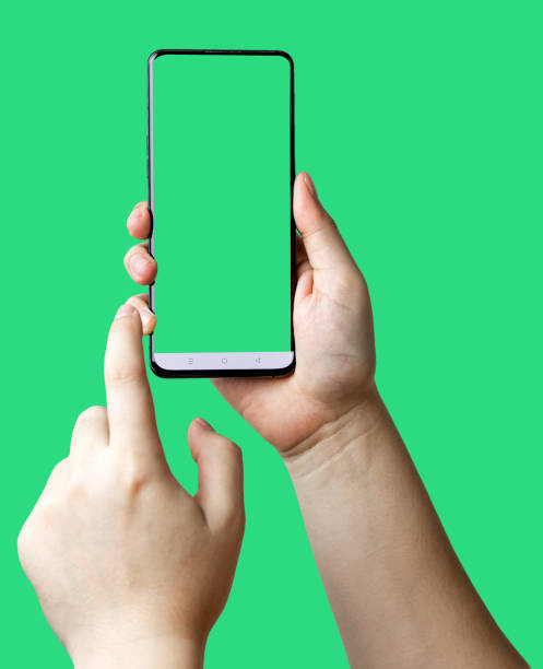 istock Male hands touching screen mobile phone a vertical smartphone with blank screen isolated on background. 1713055322