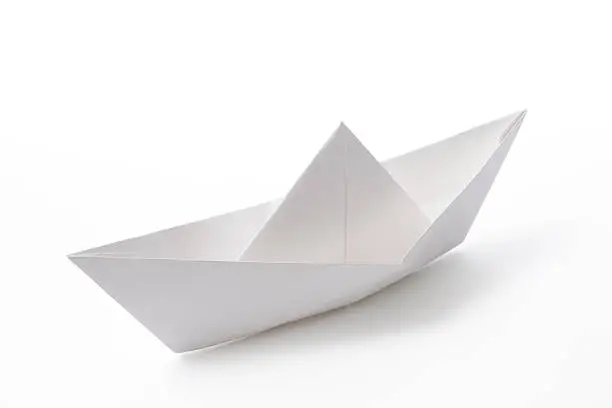 Blank paper boat isolated on white background with clipping path.