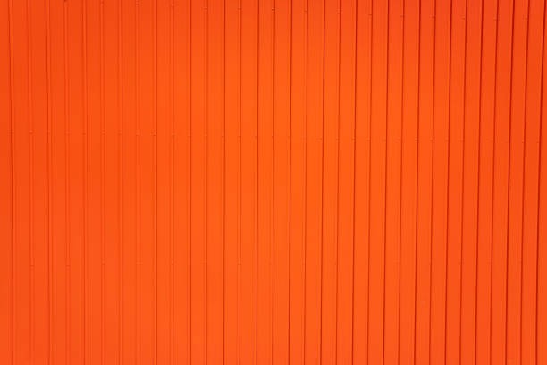 istock Red metallic background of parallel vertical lines 1713058755