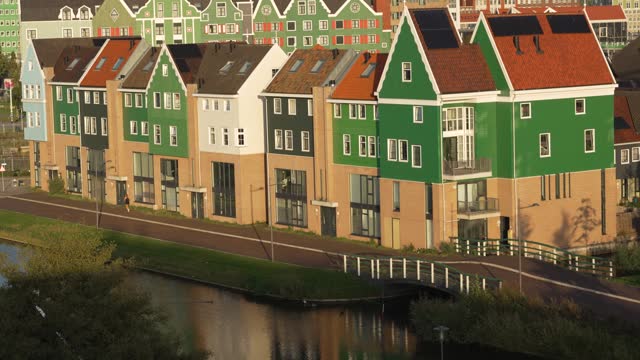 Modern dutch homes by the canal in Zaandam