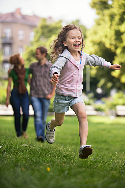 istock Young girl running in the park 171306135