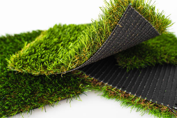 istock Sample pieces of green artificial grass of different thickness. 1713062834