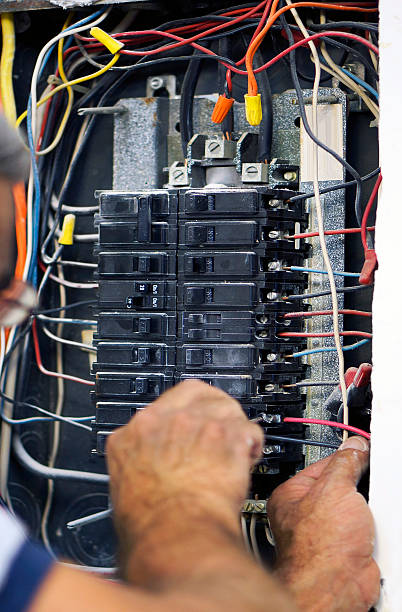 Work on electrical panel stock photo