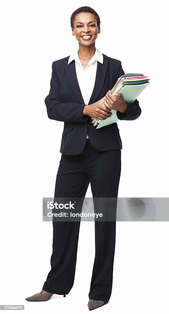Businesswoman Holding Office Documents - Isolated Full length portrait of a professional African American businesswoman holding office documents. Vertical shot. Isolated on white. Women Stock Photo