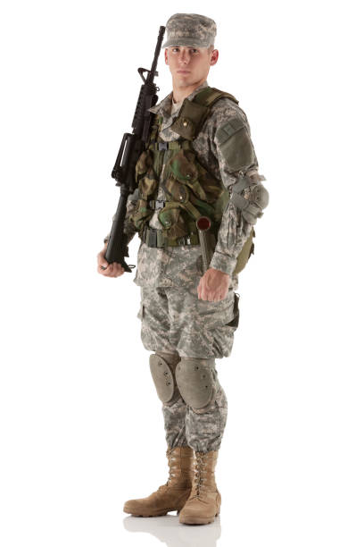 istock Army soldier standing with m16 machine gun 171306735