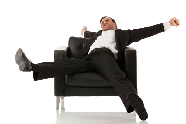 istock Businessman stretching on an armchair 171306949