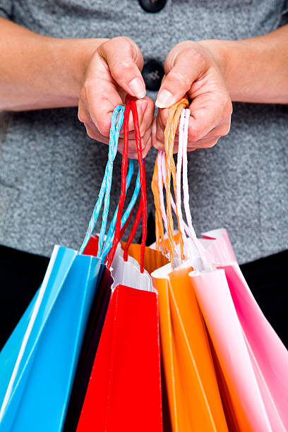 istock Holding shopping bags 171307260