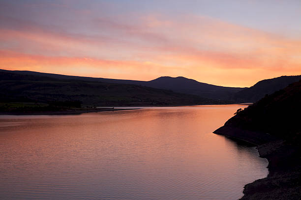 istock Bright Red Sunset Silhouette of Lake 171307407
