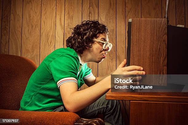 Dedicated Tv Watcher Stock Photo - Download Image Now - Television Set, 1980-1989, Humor