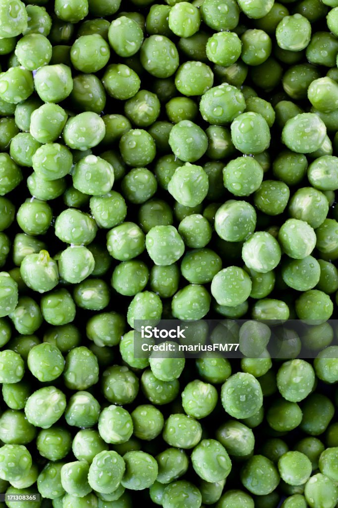 wet peas Green peas background Agriculture Stock Photo