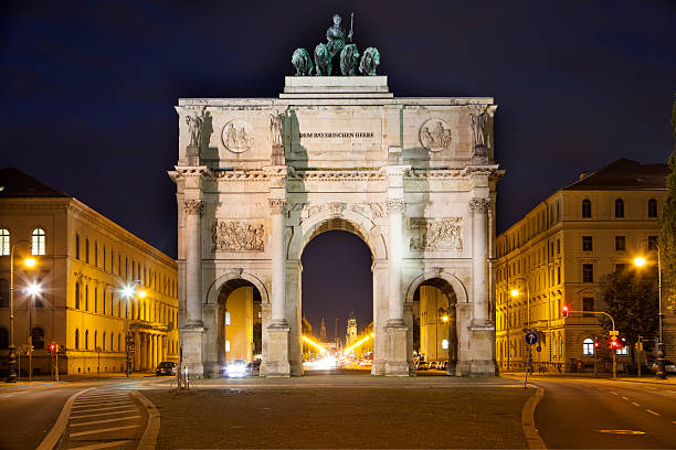 Arch of Victory in downtown Munich at night Arch of Victory in downtown Munich at night. Quadriga statue on top.See also siegestor stock pictures, royalty-free photos & images