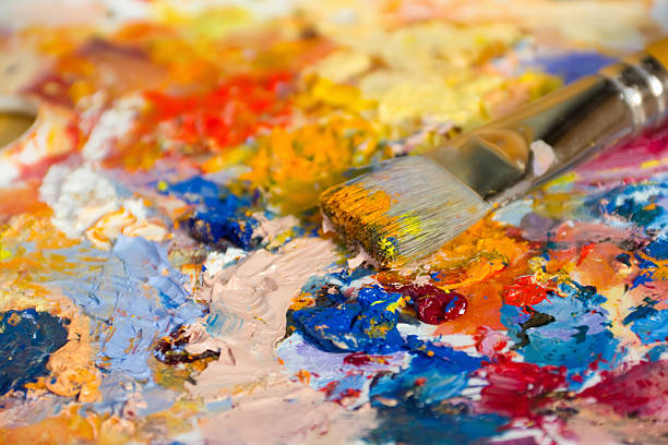 istock mixing oil paints with a brush 171310220