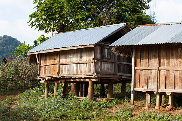 UXO Village in Laos Pillar of the houses are made of bomb shells. miao minority stock pictures, royalty-free photos & images