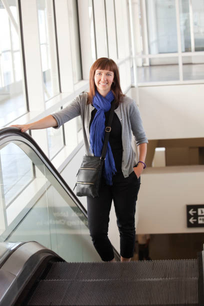 istock Beautiful Woman On Escaltor 171310610