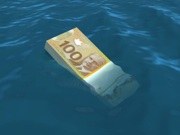 istock Money sinking in water 171310637