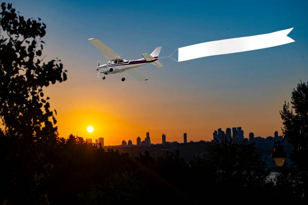 istock Airplane with banner at sunset time 1713106912