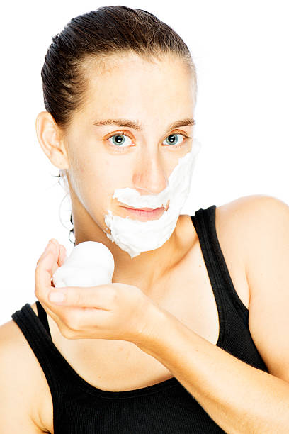 istock Young Woman Shaving Her Face 171310903