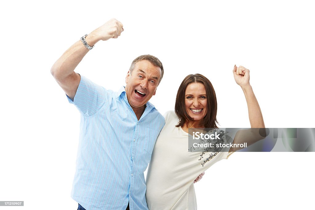 Felice coppia matura si gode il successo - Foto stock royalty-free di Coppia di età matura