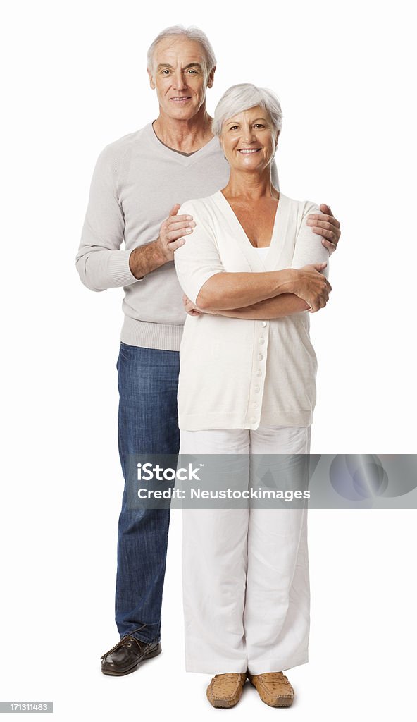 Elderly Couple Standing Together - Isolated Full length portrait of a happy senior couple standing together. Vertical shot. Isolated on white. Active Seniors Stock Photo